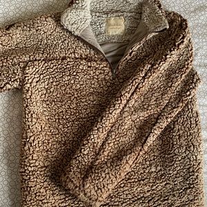 Womens sweater runs large
